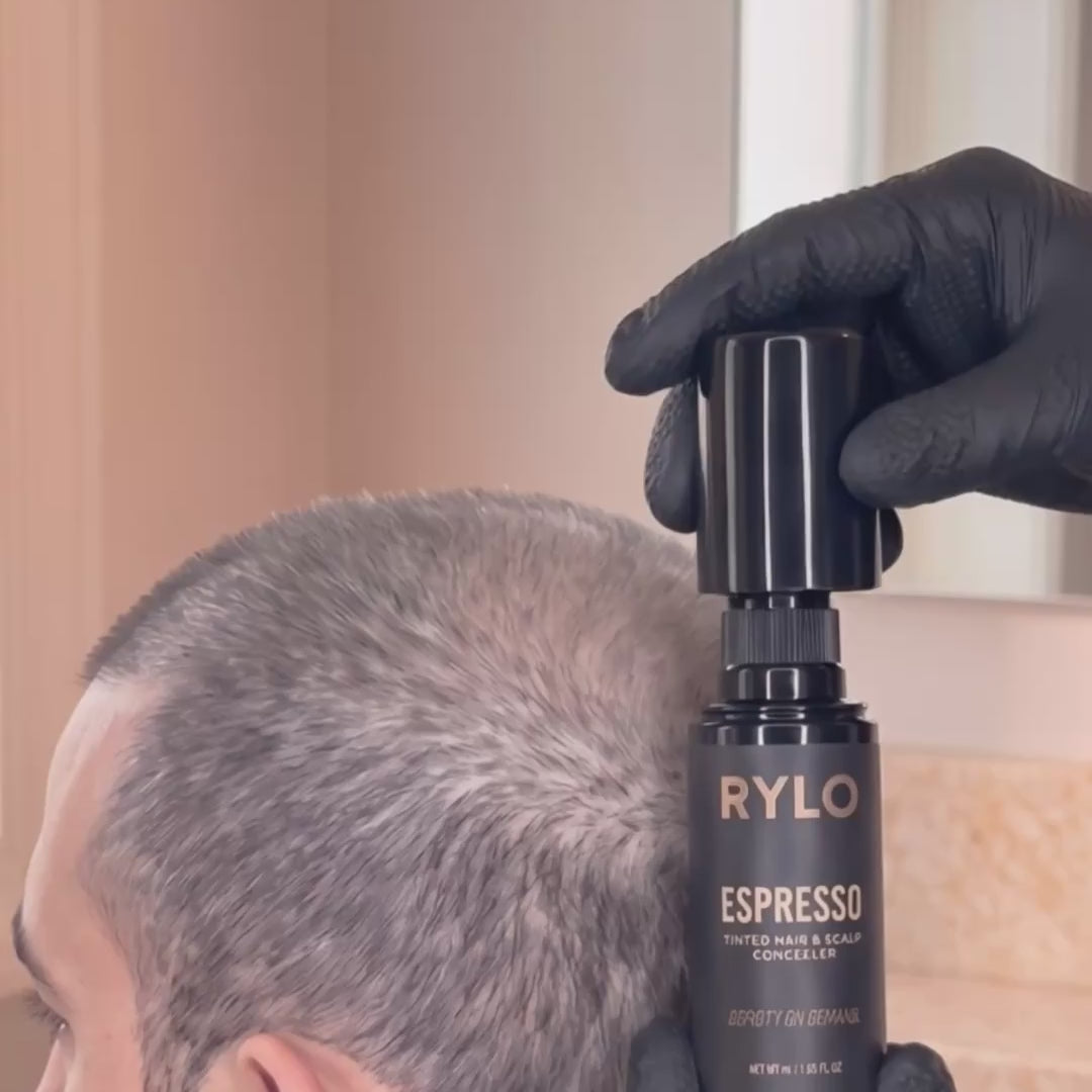 Applying RYLO with gloves, massaging it in, then wiping with a white towel that stays clean: no transfer